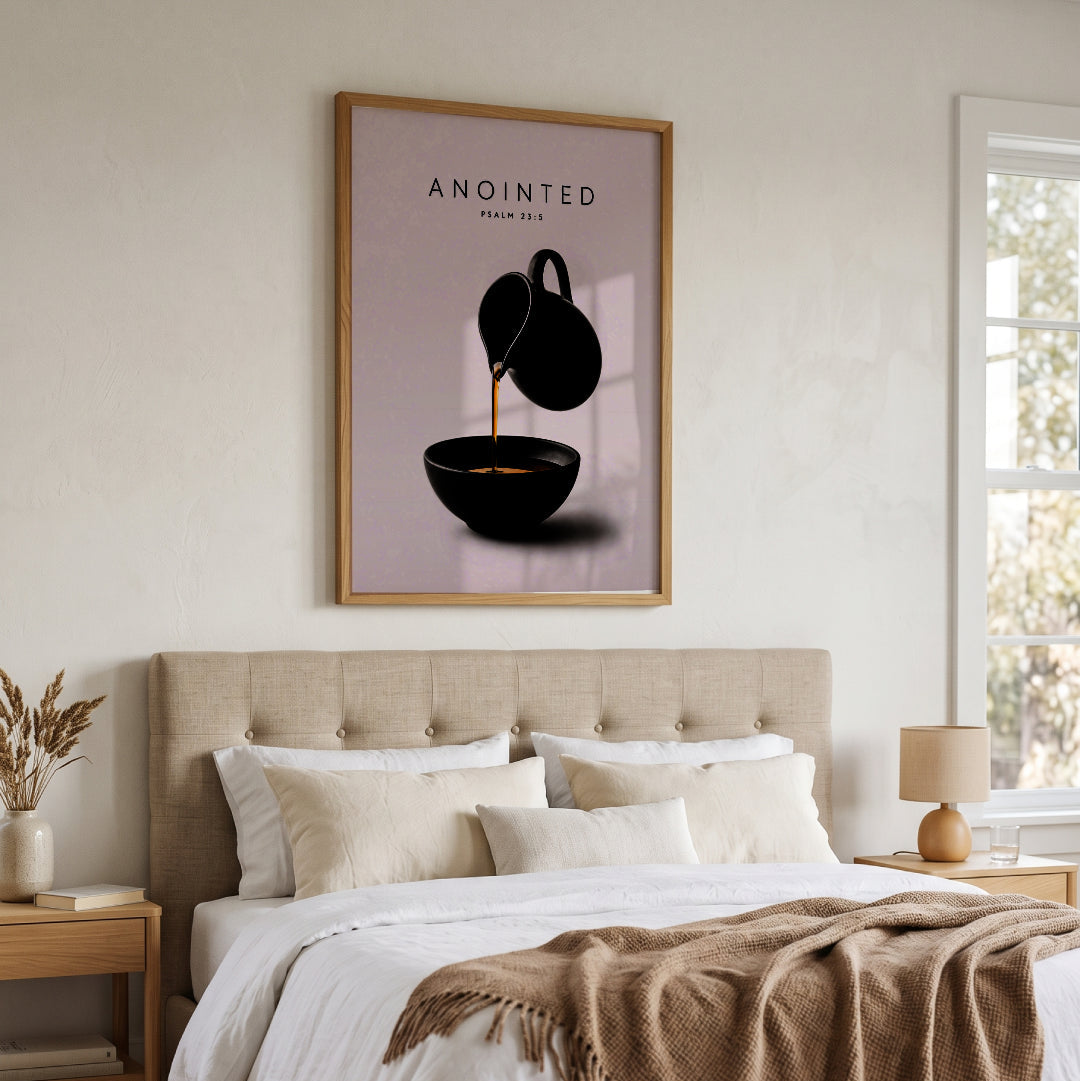 Anointed Psalm 23:5 my cup overflows wall art above a bed in a neutral bedroom.